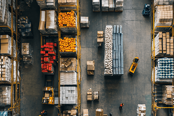 Image: A busy shipping warehouse representing the supply chain.