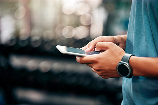 Image: Client using a mobile phone.