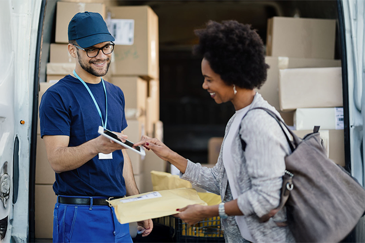 Image: A shipping courier delivering a package.
