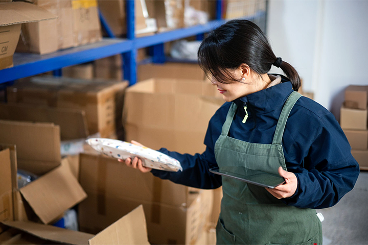 Image: A warehouse worker pulling items for drop shipping.