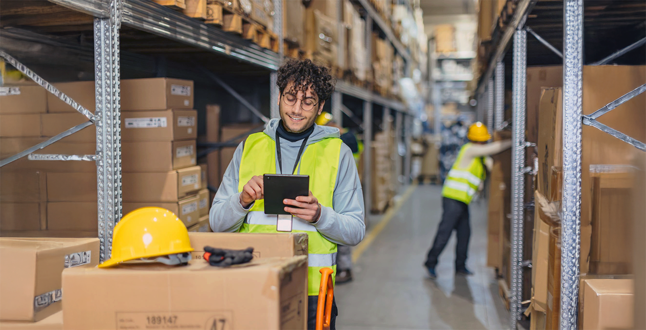 Image: A warehouse worker auditing parcels.